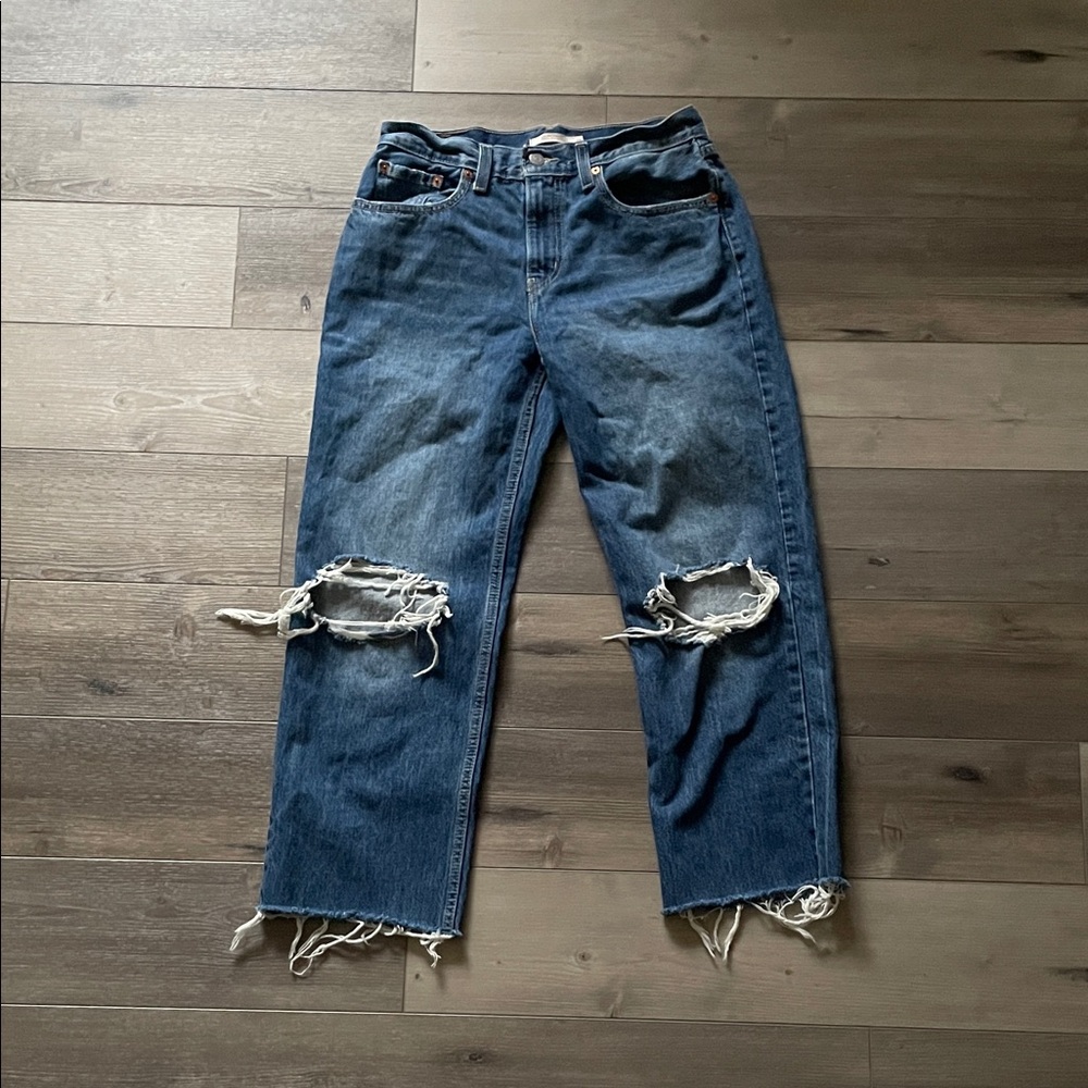 levi’s dark wash low rise straight jeans – size 28, ripped knees